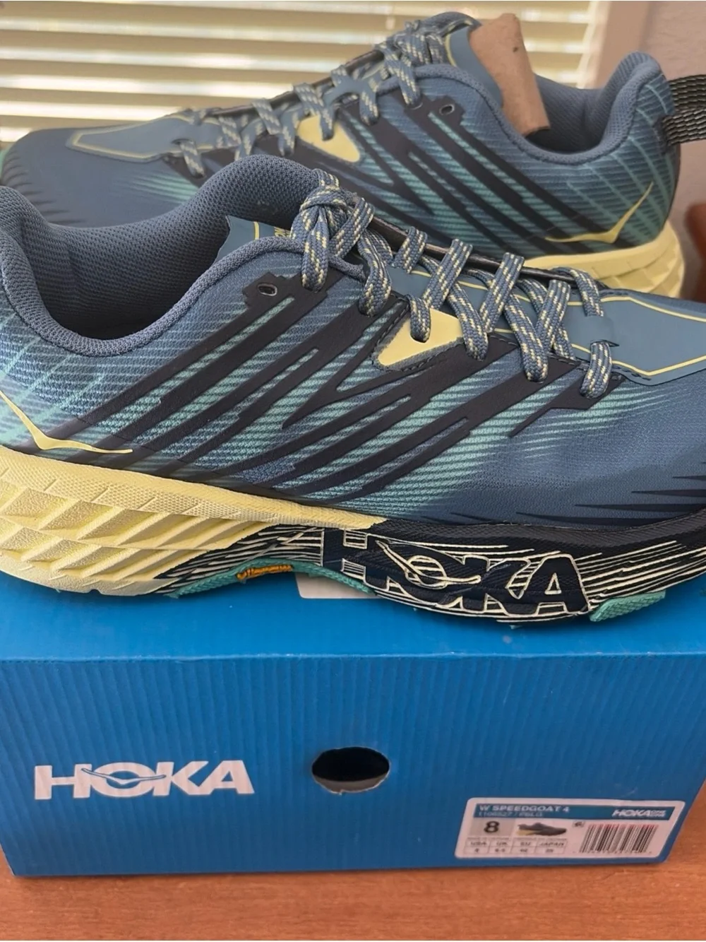 Hoka One One Women's Blue and Pale Yellow Trail Runners